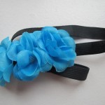 Hårbånd med turkis blomster