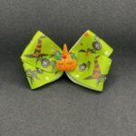 edderkopper og heksehatte-sløjfe